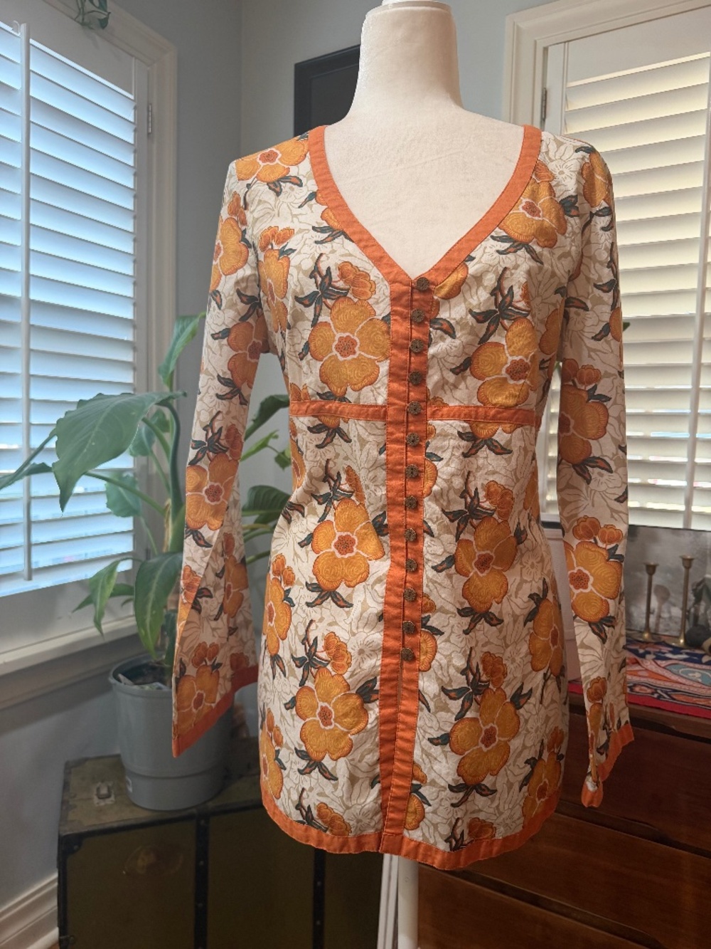 100% cotton orange floral button up tunic.